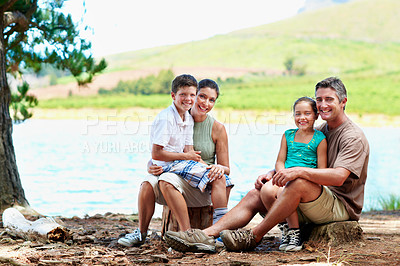 Buy stock photo Family, camping and portrait by lake for holiday with love, bonding and relax in nature together. Mother, father and children with people in forest for vacation, summer trip and travel in wilderness