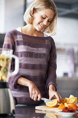 Buy stock photo A young woman with a homemade smoothie