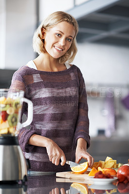 Buy stock photo A young woman with a homemade smoothie