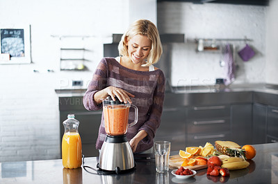 Buy stock photo A young woman with a homemade smoothie