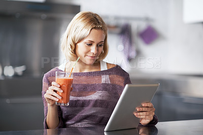 Buy stock photo A young woman with a homemade smoothie