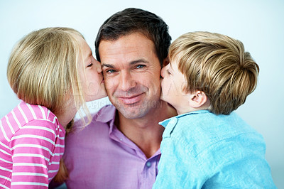 Buy stock photo Happy, dad and children in living room with kiss, family bonding together and gratitude for papa. Portrait, man smile and kids in house with affection, connection and appreciation on fathers day.