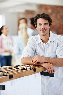 Buy stock photo Creative, business and man in office with portrait, smile and career ambition or confidence in agency. Interior designer, happy person or employee in workplace for project management or development