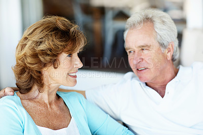 Buy stock photo Conversation, happy and senior couple on patio for bonding, relationship and connection on weekend. Retirement, smile and man with woman in backyard talking for love, commitment and trust in marriage