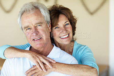 Buy stock photo Happy, portrait and old couple in home hug for bonding, commitment and loyalty for marriage. Retirement, smile and man with woman embrace for affection, love and connection for relationship support