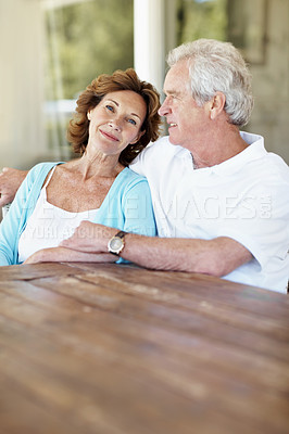 Buy stock photo Thinking, smile and old couple with love on patio, peace and calm morning in backyard. Portrait, senior people or embrace in home with reflection, partner affection and bonding together on retirement