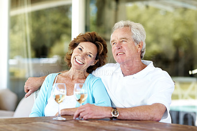 Buy stock photo Wine, smile and portrait of senior couple in backyard by home for bonding, love and anniversary date. Happy, alcohol drink and elderly man with woman for connection, commitment and care in marriage.