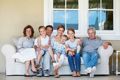 Buy stock photo Big family, portrait and children on sofa, smile and relax with senior parents on break or together. Happy people, generations and connection with kids on weekend, men and women on couch at house