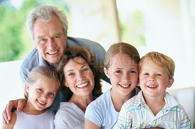 Buy stock photo Love, generations or family in backyard with portrait, security or bonding together on weekend break. Grandfather, mom or children on patio with hug, healthy relationship or happy connection at house