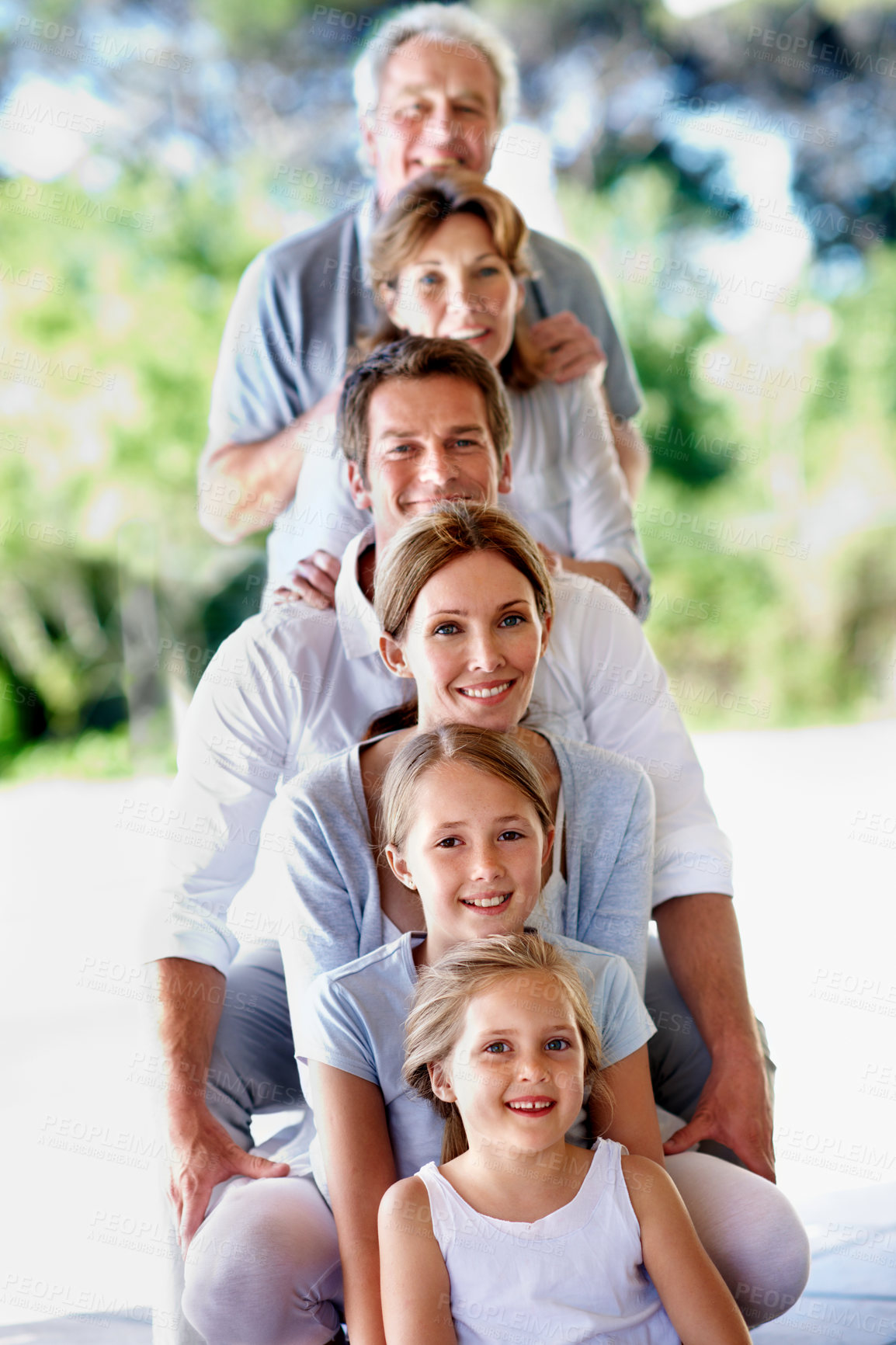 Buy stock photo Generations, portrait and parents with children in backyard for bonding, relationship and connection. Happy, house and people with senior mom, dad and kids for love, support and together on weekend