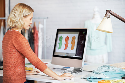 Buy stock photo A beautiful young fashion designer working on her computer