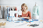 Focused of finishing her garment