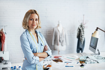 Buy stock photo A gorgeous young designer smiling the camera with arms folded