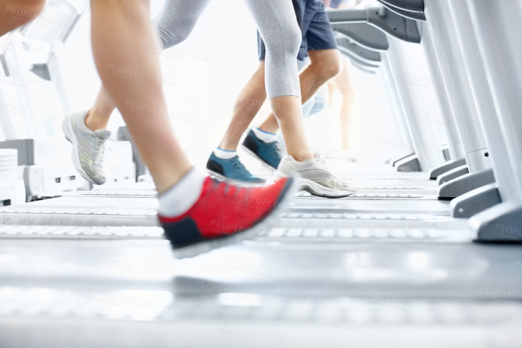 Buy stock photo Treadmill, running or legs in fitness class with exercise, cardio workout or calorie burn in speed training. Active, athletes or people with machine, group session or aerobic sprint for weight loss.
