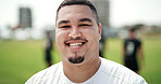 Smile, rugby and man at pitch for game training, sports and confidence at practice for wellness. Portrait, proud player and happy person on field, professional athlete and exercise outdoor for match
