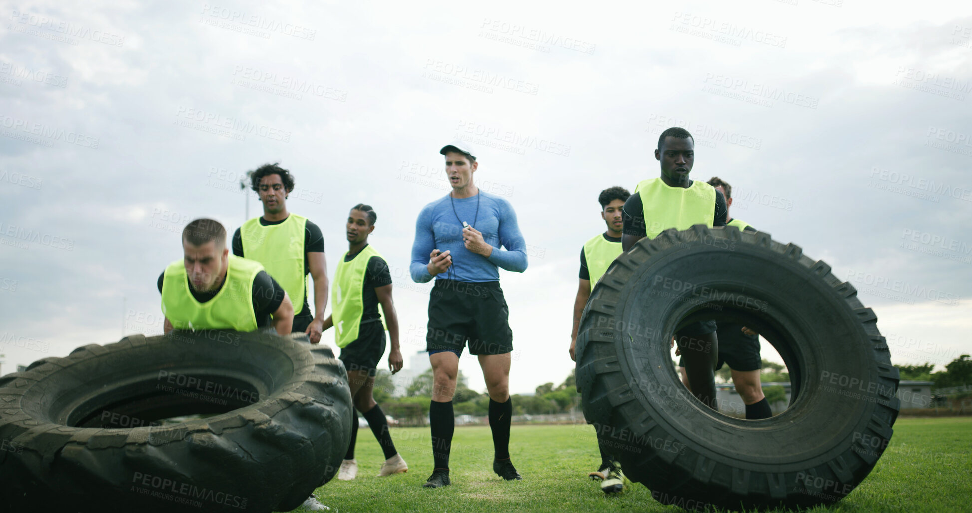 Buy stock photo Workout, coach and people with tire on field, strength challenge and training for sport competition. Coaching, trainer or rugby team with exercise for muscle development, active or weightlifting
