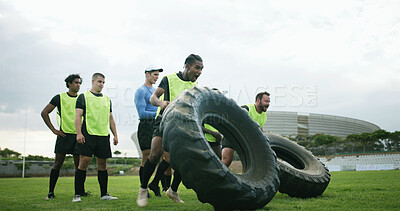 Buy stock photo Training, coach and people with tire on field, strength challenge and workout for sport competition. Space, trainer or rugby team with fitness exercise for muscle development, active or weightlifting