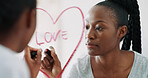Love, mirror and black woman in home with affirmations, lipstick and self care in morning. Heart, drawing and African female person with motivation by reflection with makeup for writing message.