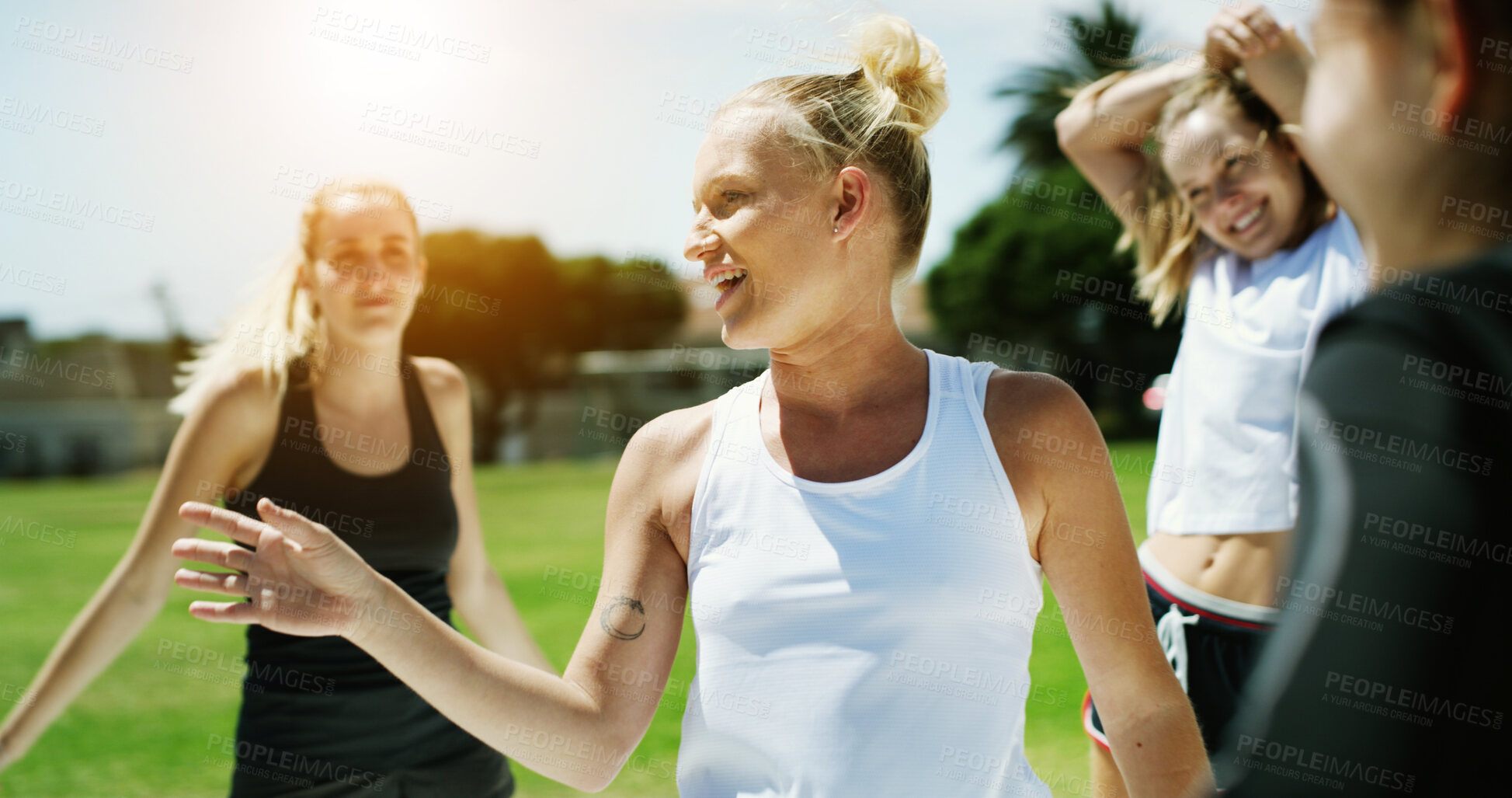 Buy stock photo Fitness, smile and stretching with women outdoor together for health, vitality or wellness. Conversation, sports and warm up with happy team of friends on grass field for start of physical activity