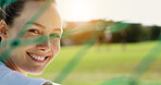Happy, net and woman on soccer field for fitness, training and positive attitude for match. Portrait, female person and outdoor with flare for football, exercise and practice sports for competition