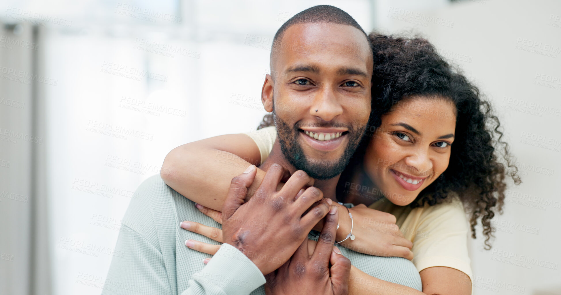Buy stock photo Happy couple, hug and portrait in home with love, bonding and connection with care in living room. People, partnership and smile with embrace, relationship and loyalty at apartment in Costa Rica