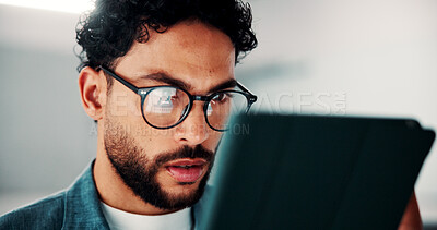 Buy stock photo Tablet, glasses and businessman in office with research for finance report with revenue growth. Digital technology, reading and financial manager with feedback on investment proposal in workplace.