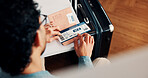 Airport, lounge and business man with ticket to check departure gate, flight info and schedule. Professional, above and person with boarding pass for travel time, terminal and waiting with suitcase