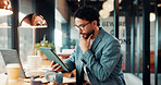 Technology, thinking and business man in cafe for remote work with proposal, online report and ideas. Restaurant, insight and person on tablet for financial review, investment solution and planning