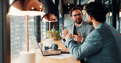 Buy stock photo Conversation, laptop and business men in office with research for finance report with budget. Discussion, computer and financial advisor with manager for feedback on investment profit in workplace.
