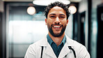 Happy, man and portrait of doctor in hospital with confidence for career in medical service. Smile, professional and male healthcare worker with pride and positive attitude for about us at clinic.