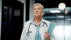 Healthcare, doctor and woman with documents in hospital, serious and thinking with medical diagnosis. Clinic, health specialist and mature person with file, wellness and decision with patient records