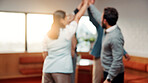Business, team and people with high five in office support, celebration or solidarity at startup. Success, achievement and circle in blur with motivation, group and hands together at creative agency