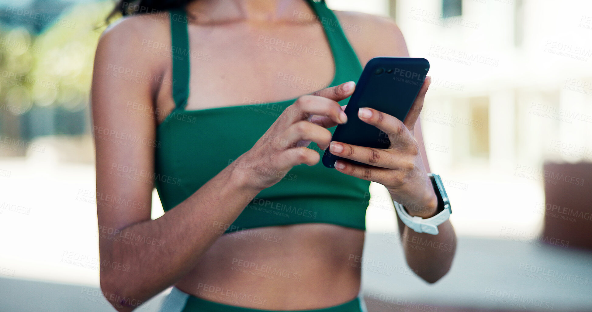 Buy stock photo Fitness, scroll and hands with phone in city, communication and wellness update on social media app. Typing, message and person with mobile for chat, outdoor and athlete with health tips on website