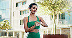 Fitness, happy and woman with smart watch in city for exercise progress, workout app and health. Sports, runner and person with tech, earphones and time for wellness, training stats and music in town