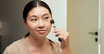 Facial roller, skincare and woman in home, reflection and grooming with morning, treatment and shine. Japanese person, bathroom and cosmetic tool for anti aging, lymphatic drainage or wellness