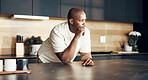 Thinking, black man on relax on kitchen counter in home, vision and daydreaming for calm morning. Serious, male person and house with reflection, nostalgia memory and perspective for weekend break