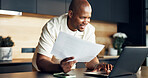 Finance, paperwork and happy man with laptop in home for tax refund, credit balance or debt free. Budgeting, black person and documents with tech for wealth growth, investment progress and planning