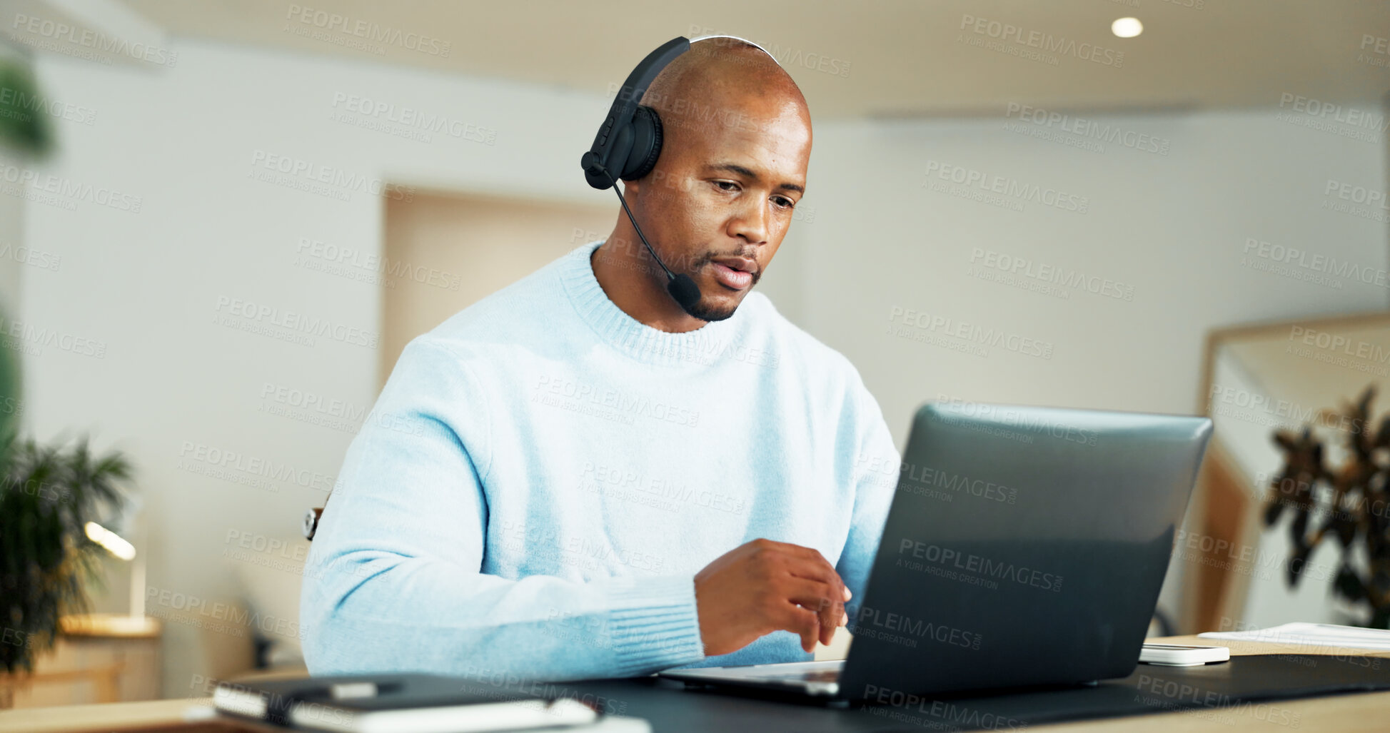 Buy stock photo Laptop, headphones and black man in home for customer service, crm or call center with remote work. Mic, computer and African technical support agent with online consultation for advisory in house.