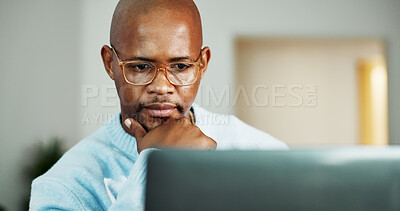 Buy stock photo Review, planning or black man with laptop for remote work, accounting audit or internal risk reflection. Reading, freelancer or financial controller with idea for compliance policy, computer and home