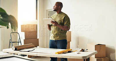 Buy stock photo Man, tablet and thinking in new home for remodeling, interior planning and research for ideas. Black person, tech and blueprint in apartment for renovation, revamping project and app for inspiration