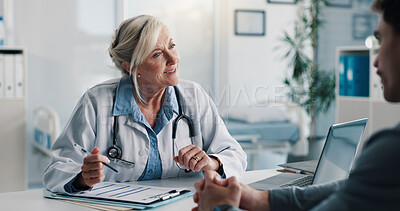 Buy stock photo Clipboard, discussion and doctor with man in hospital for consultation on medical diagnosis. Documents, writing and healthcare worker with male patient in checkup for treatment plan in clinic.
