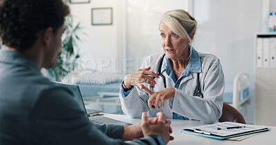 Buy stock photo Advice, consultation and doctor with man in clinic for discussion on medical diagnosis. Checkup, talking and healthcare worker with male patient in conversation for treatment plan in hospital.