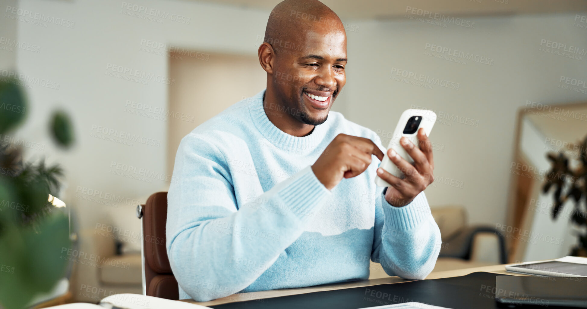 Buy stock photo Phone, happy and black man in home with texting, chatting or social media on mobile app. Smile, technology and African male person with cellphone for email, connectivity or contact in apartment.