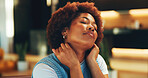 Neck pain, stretching and black woman at night for remote work, stress relief and overworked. Freelancer, home and person with tension, strain and fatigue for creative career, overtime and deadline