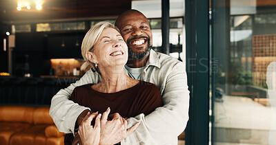 Buy stock photo Love, hug or interracial couple in home with pride, partner care or bonding on weekend break. Trust, portrait or mature people with smile, connection or romantic embrace in healthy relationship.
