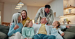 Happy, relax and big family on sofa in home with bonding, conversation and care on weekend. Laughing, calm and children with grandparents and parents in living room for connection together in house.