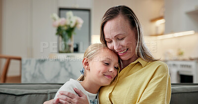Buy stock photo Hug, happy and mother with child in house for bonding, love and trust on weekend together. Smile, connection and mom embracing girl kid in living room for relax, safety and family in apartment.