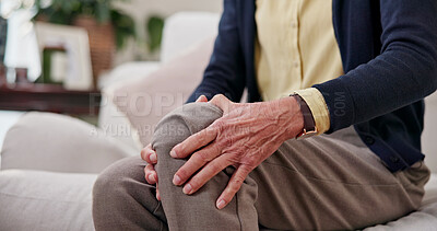 Buy stock photo Senior, hands and discomfort with knee pain on sofa for tendinitis, arthritis symptoms and ache. Pensioner, old person and tender joint in house with stiffness, fibromyalgia risk and muscle tension