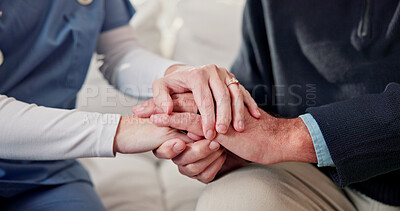 Buy stock photo Empathy, nurse and old person in house with holding hands, support or bonding together with comforting. Compassion, elderly man or caregiver with security, understanding and trust in retirement care.