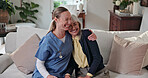 Support, nurse or old woman in home with hug, sympathy or bonding together with comforting. Compassion, elderly person or caregiver with security, happy moment and understanding in retirement care.